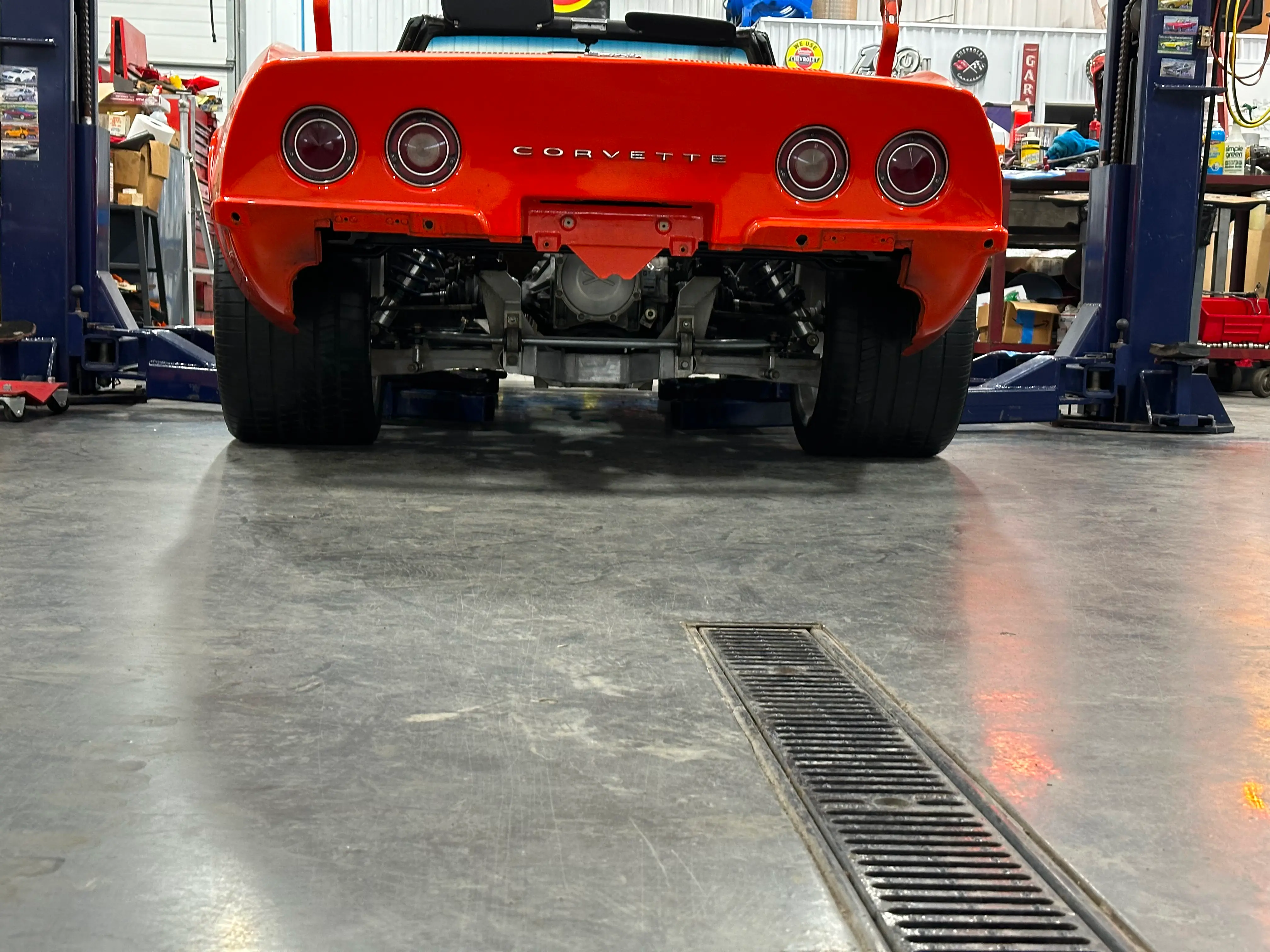 The body sitting on the new chassis on the ground