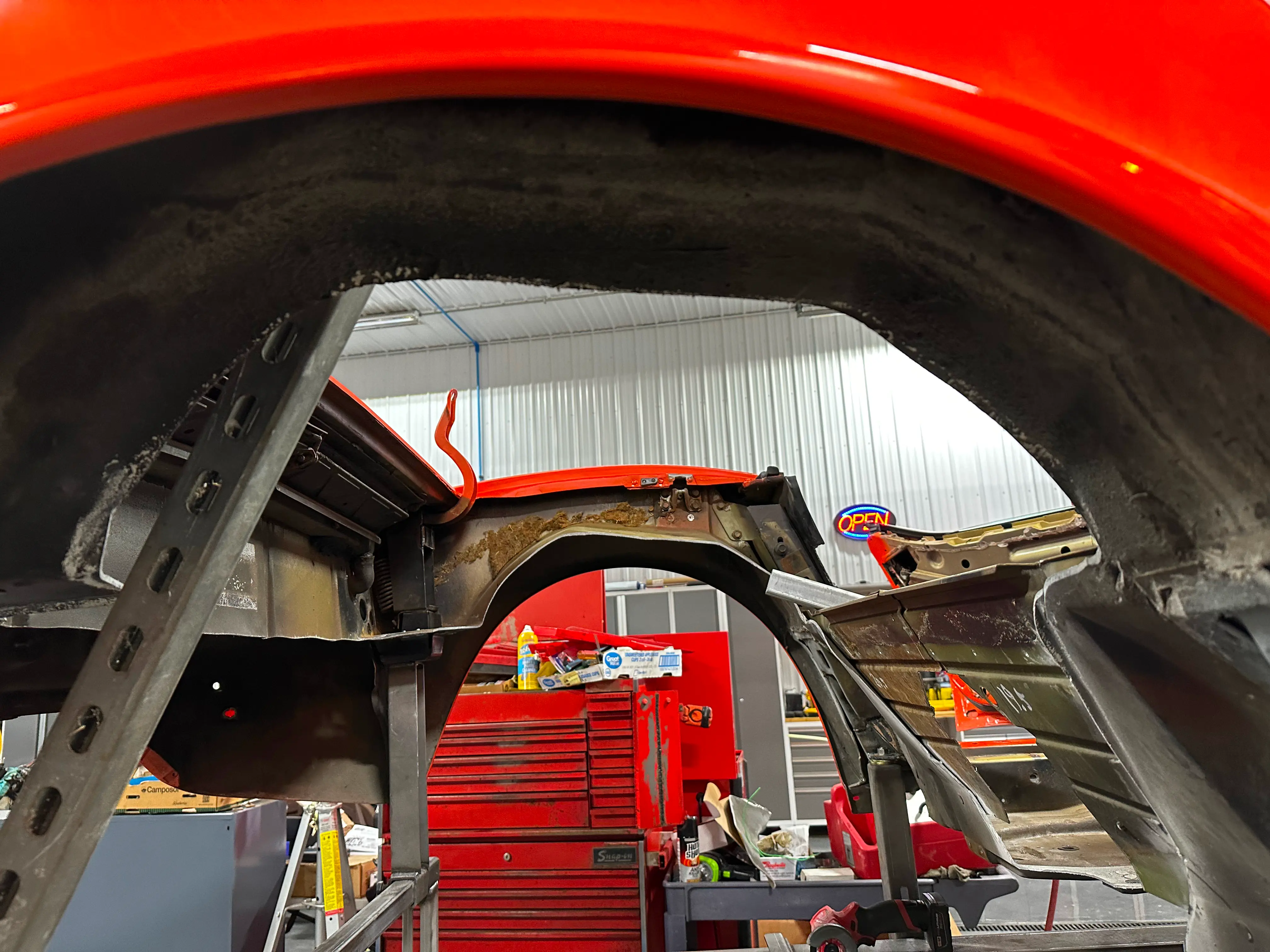 The hole left by the rear tray